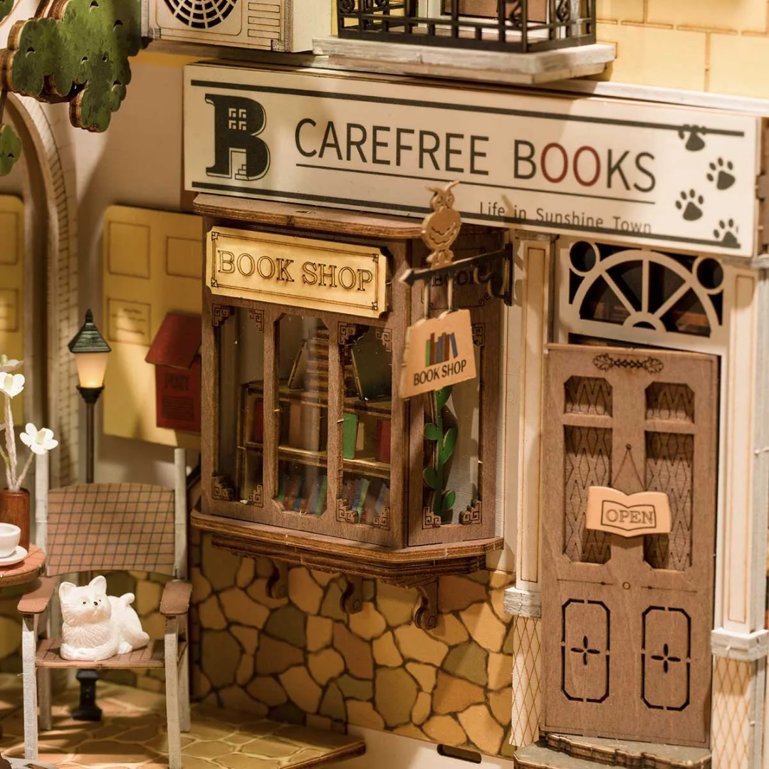 Kouzlo za zataženými dvířky – DIY Book Nook - Sluneční město | Robotime